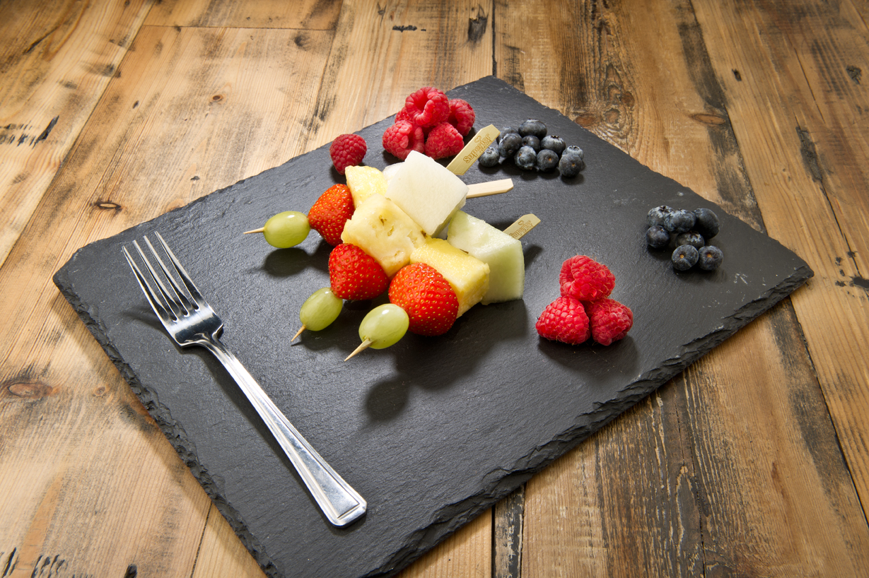 Fruit skewers with melon and pineapple