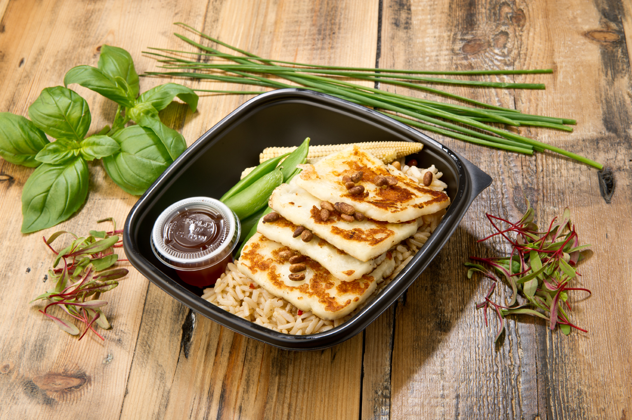 Delicious looking meal in a bowl with rice and herbs