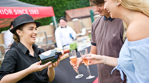 Catering staff serving drinks